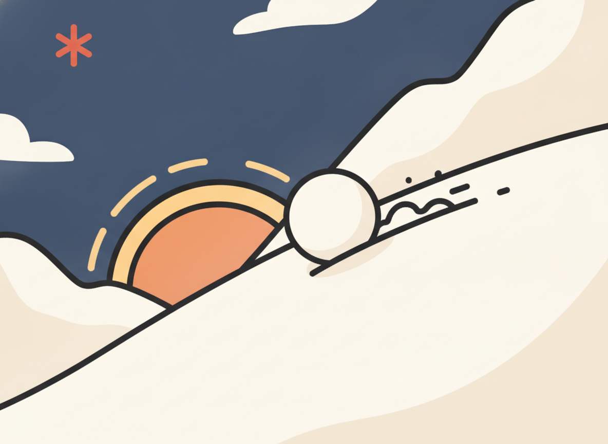 a small snowball rolling down a gentle white slope