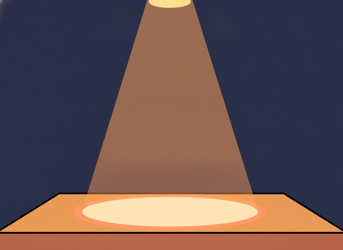 body image 8 – a single spotlight on an empty stage wit