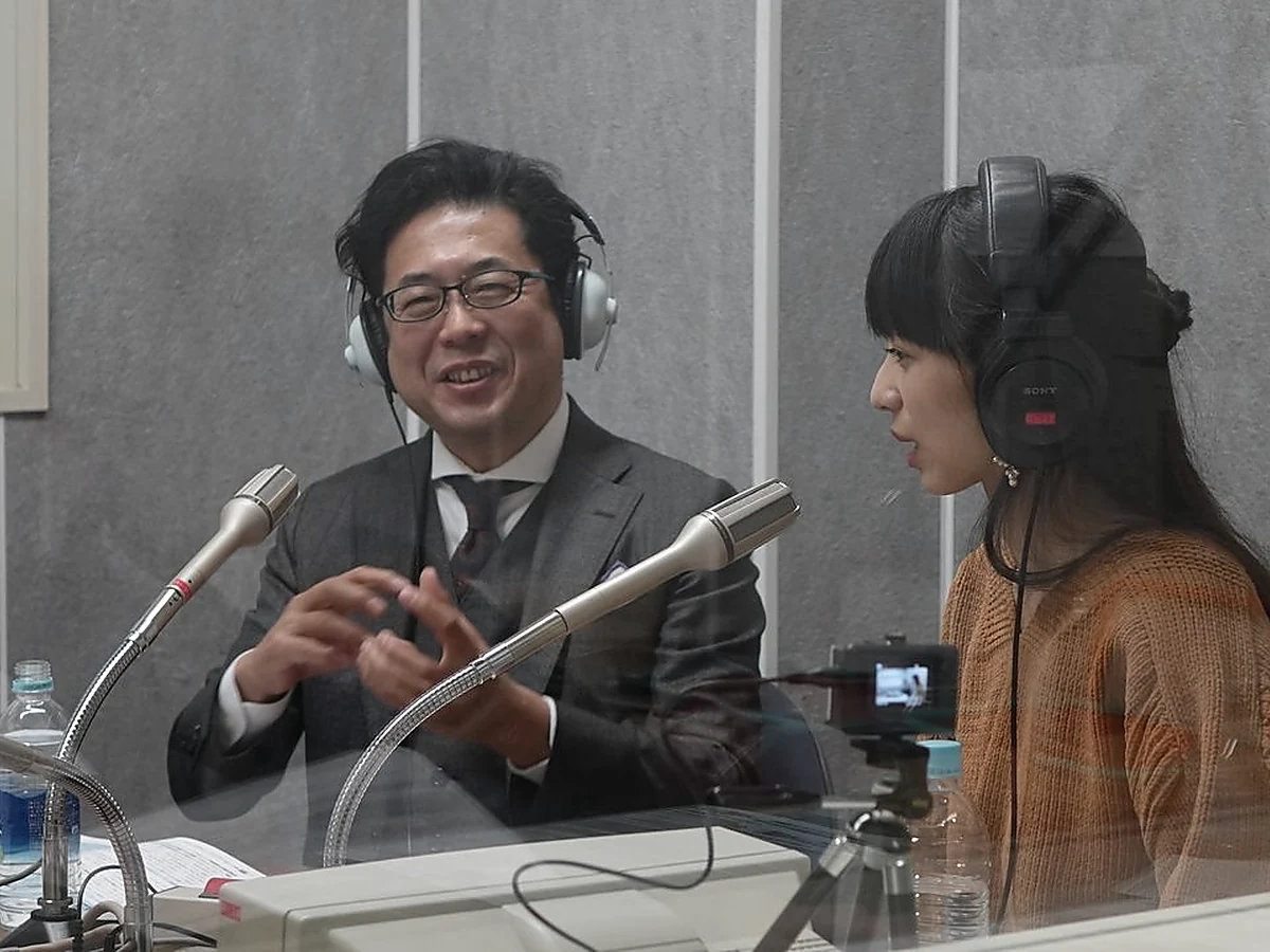 two professionals listening carefully in a quiet modern room